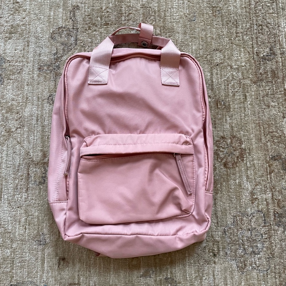 Small Pink Backpack with 2 pockets.